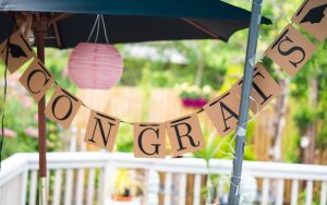 Congrats letters under a parasol with a lantern